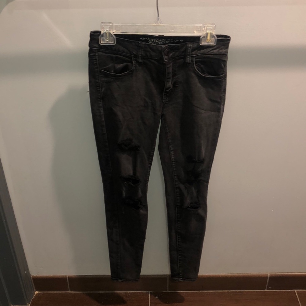 Distressed black AE jeans
